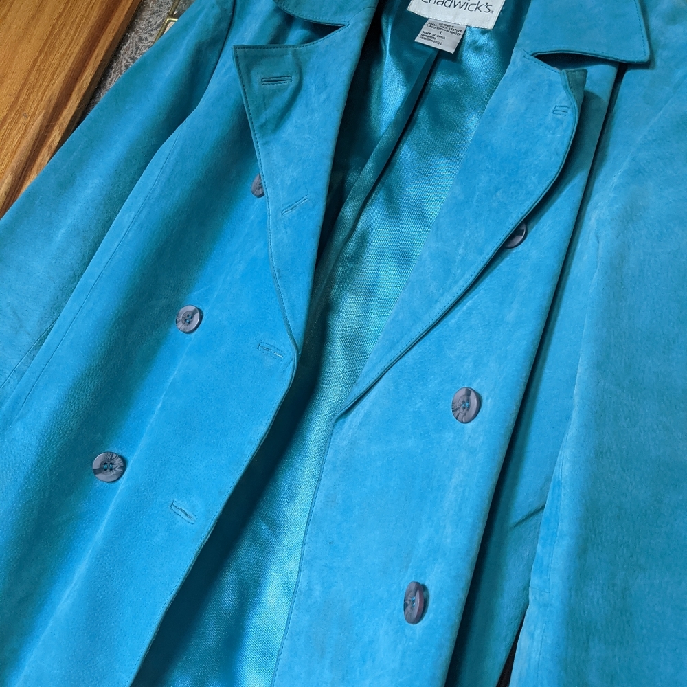 turquoise trench coat